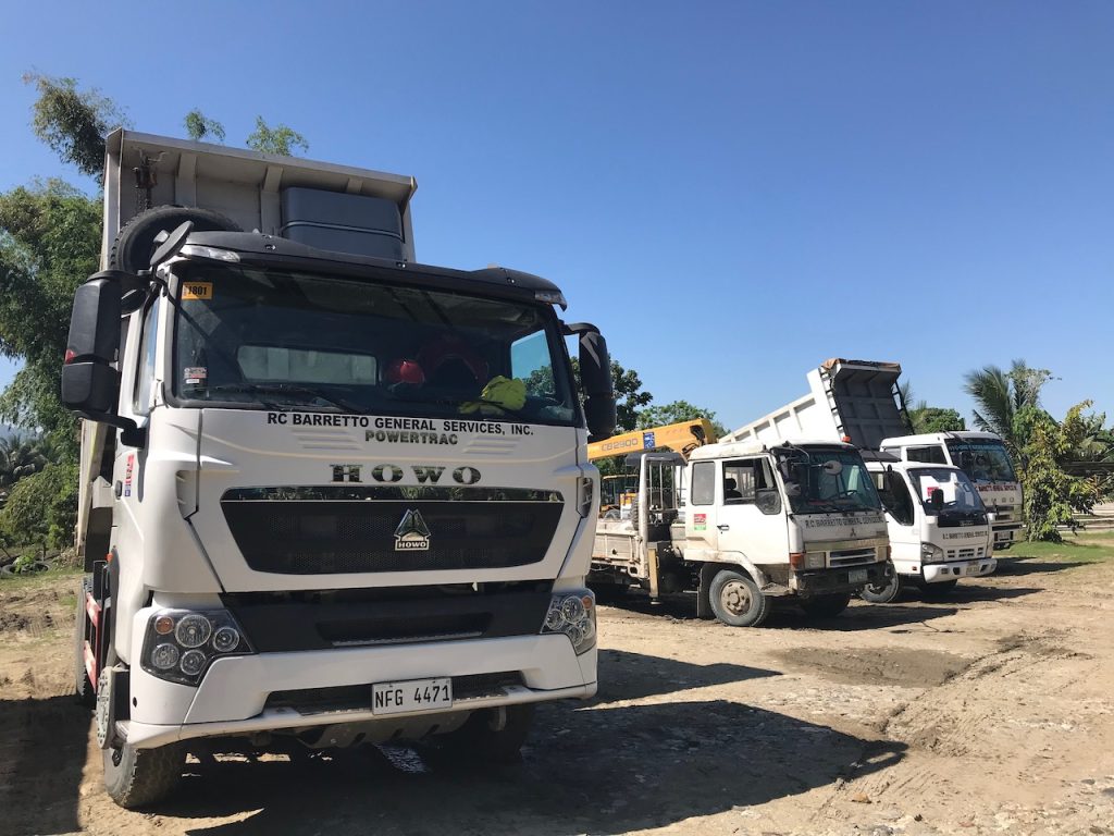 Various heavy equipment such as trailers, boom truck, dump truck in Philippines